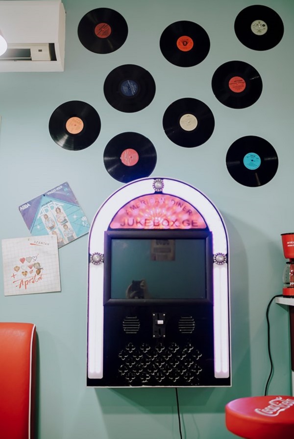 Jukebox.ge unit mounted inside retro diner style venue